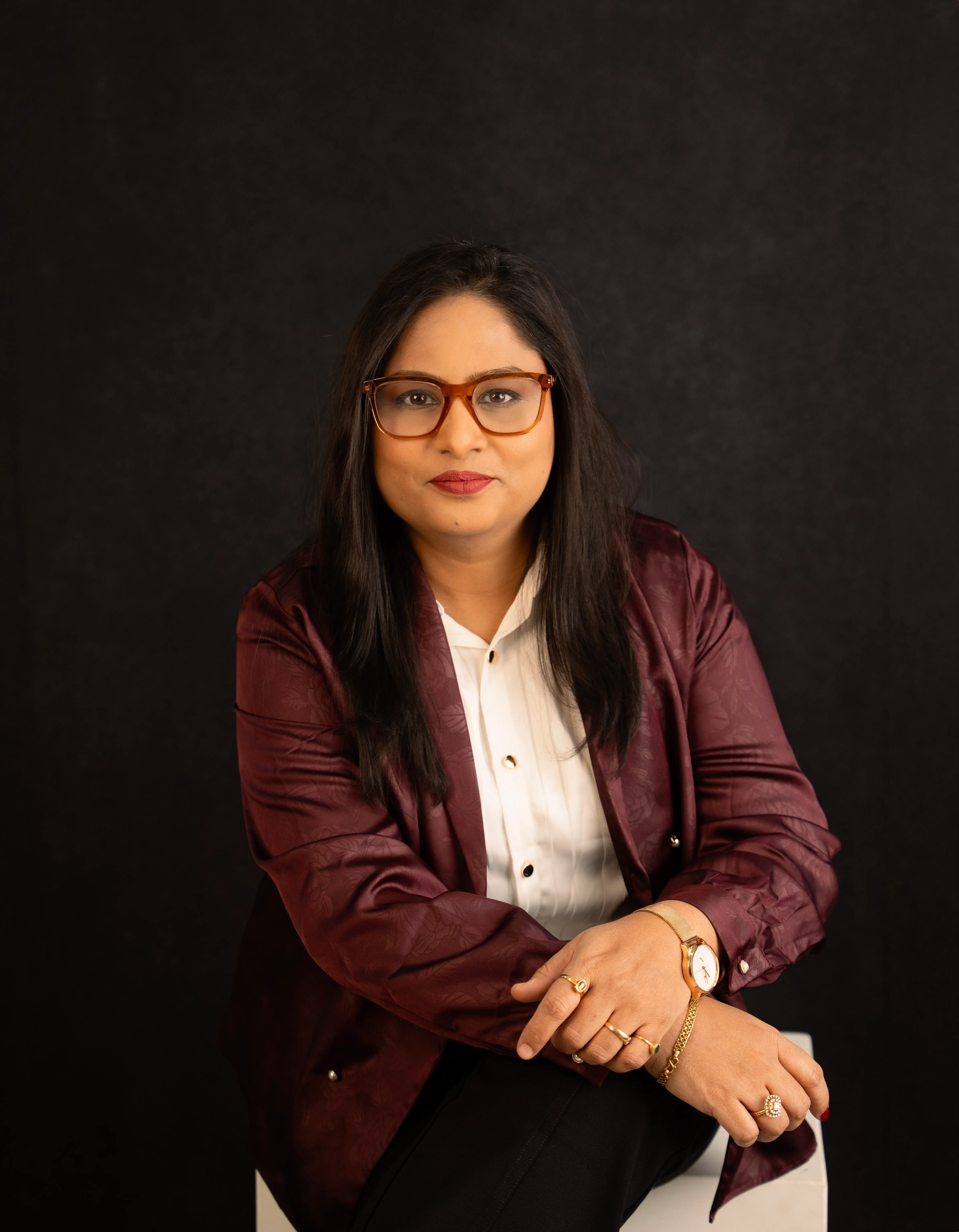 Coach Madhubala in a warm professional portrait