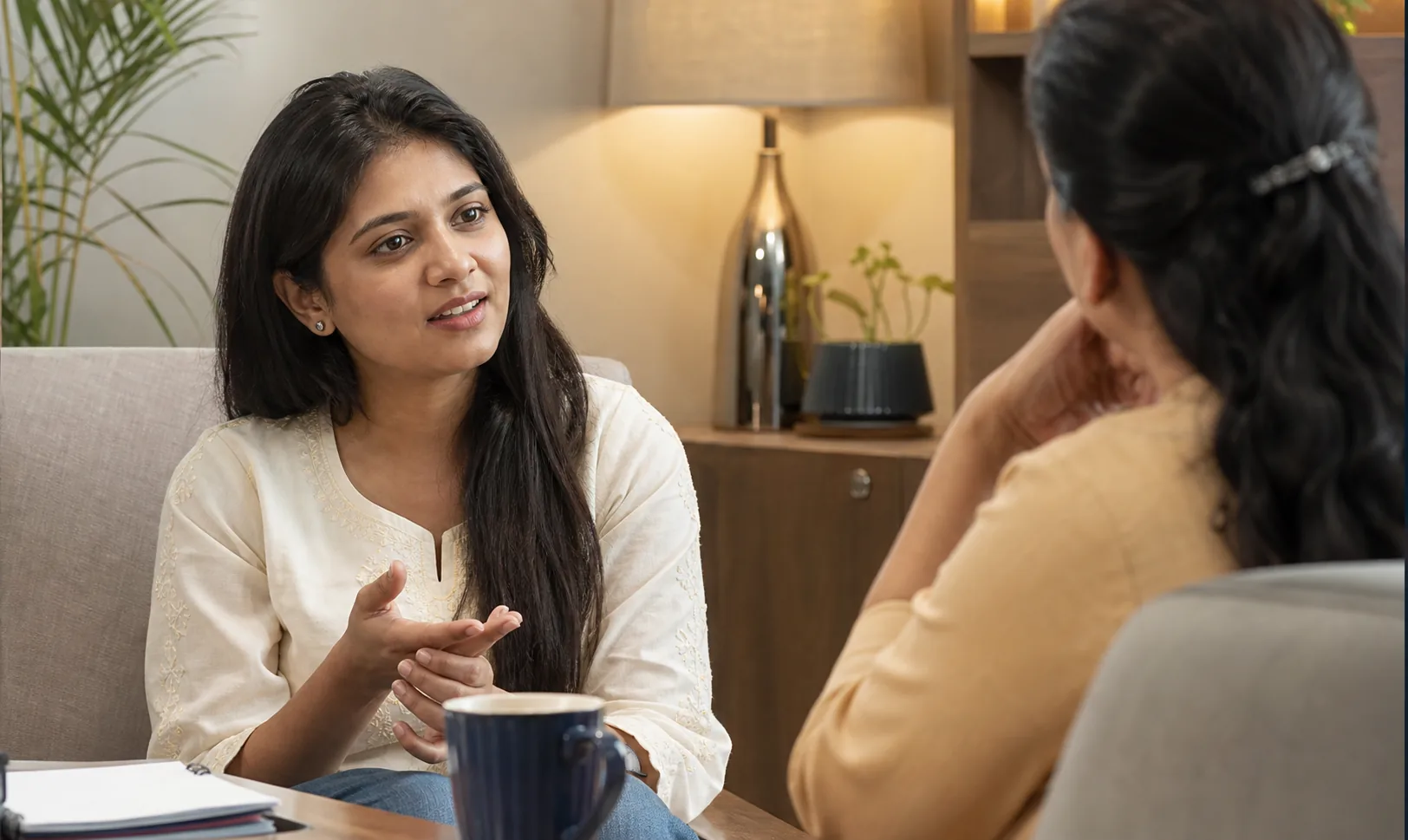 Indian woman receiving supportive one-to-one guidance